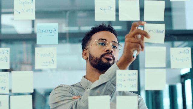 Shot of a young businessman having a brainstorming session in a modern office.