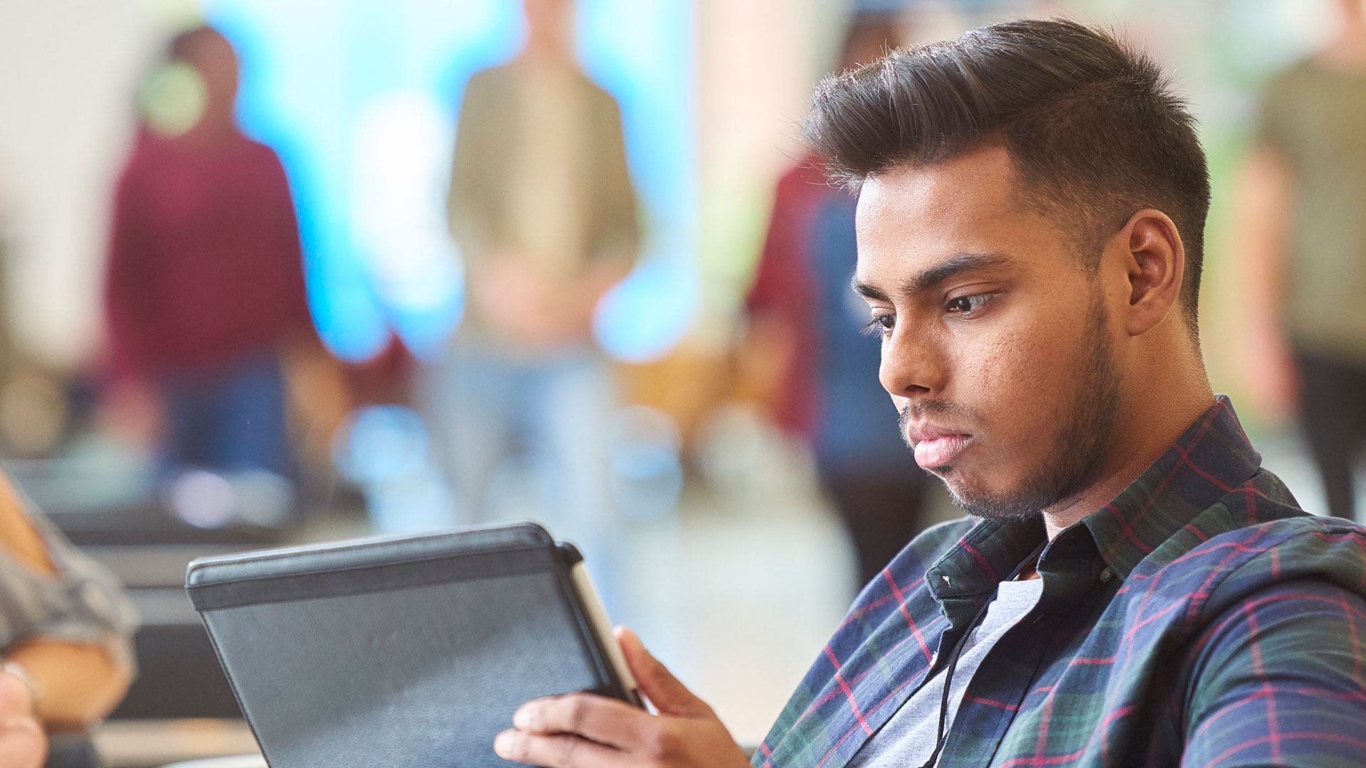 A student using their tablet