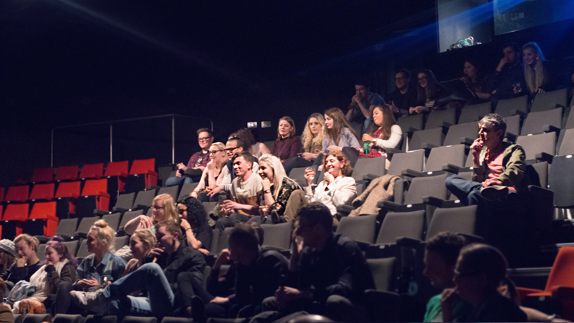 An audience in an Arts Centre theatre