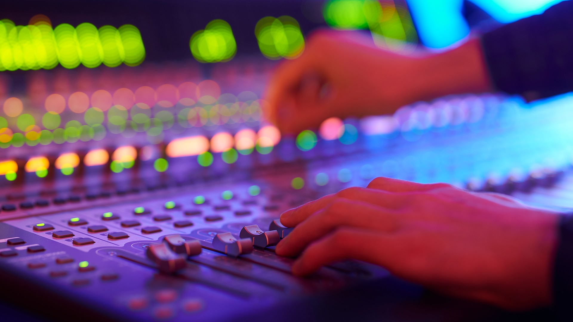 A close up of a mixing desk
